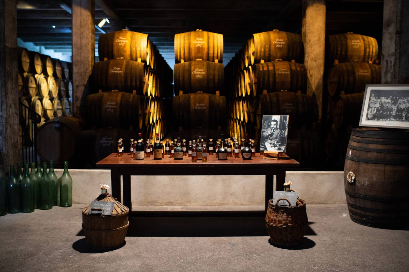 A collection of vintage Courvoisier bottles