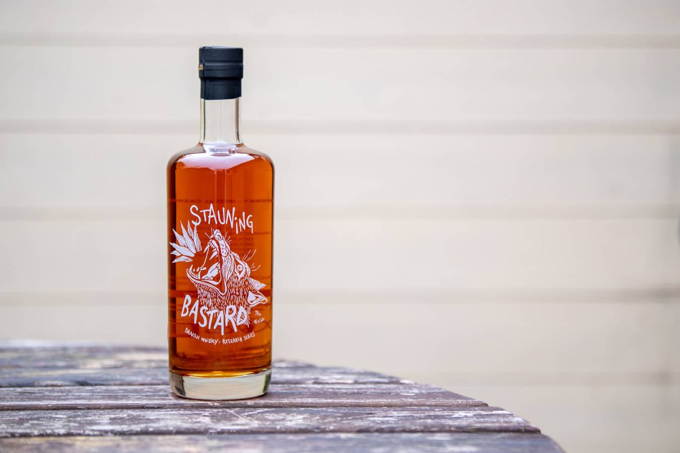 Stauning whisky set against a plain background
