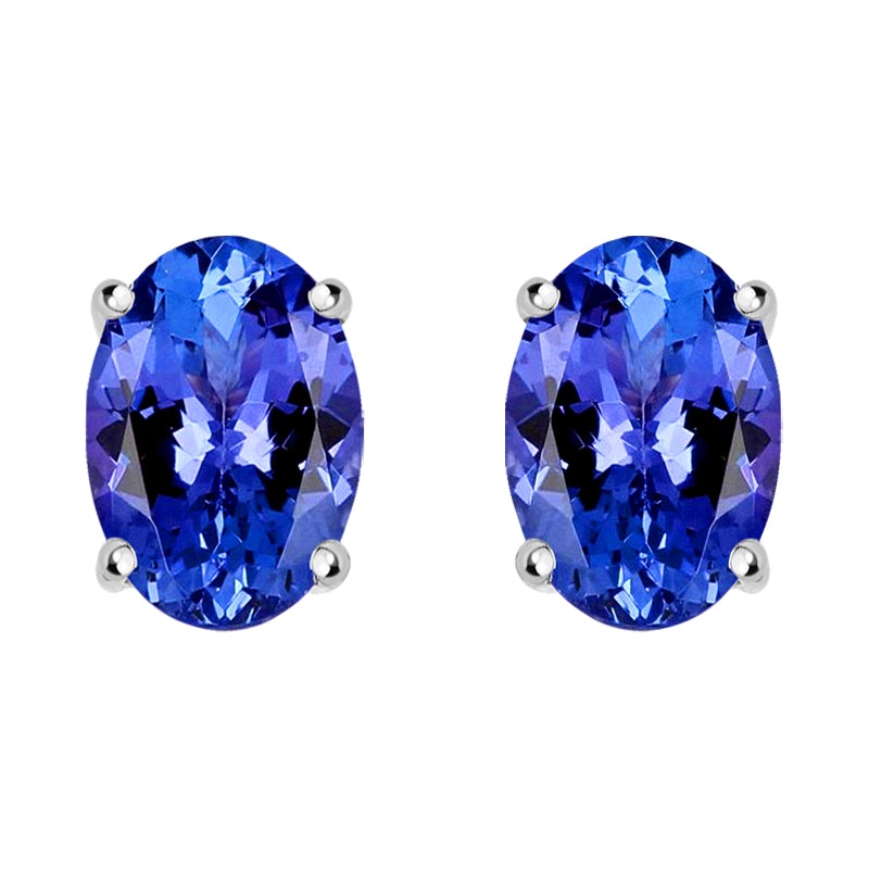 18ct White Gold Tanzanite 6x4mm Oval Claw Set Stud Earrings