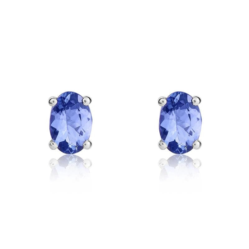 9ct White Gold Tanzanite 6x4mm Oval Claw Set Stud Earrings