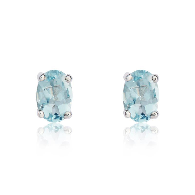 9ct White Gold Aquamarine 6x4mm Oval Claw Set Stud Earrings