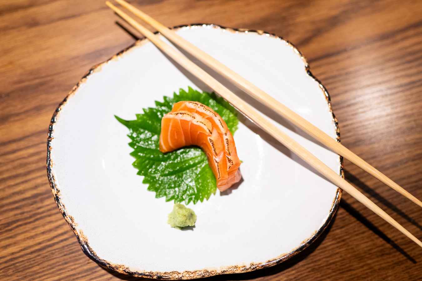 The salmon has been touched by a flame