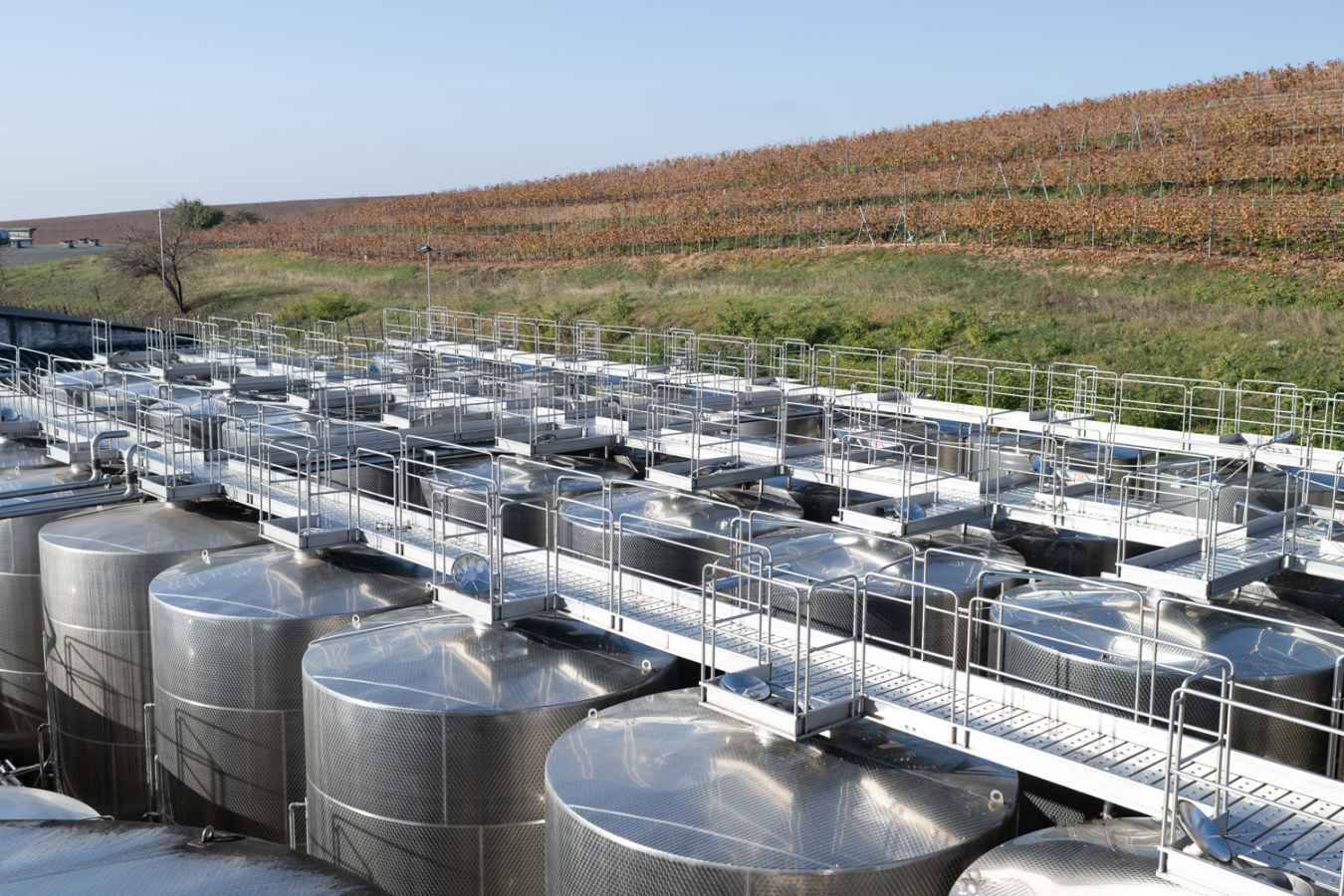 The tanks overlooking the vineyards