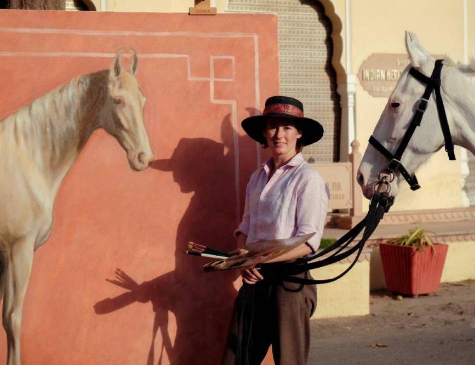 Nukra inspects her portrait in The City Palace courtyard, Jaipur