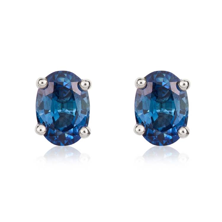9ct White Gold Sapphire 7x5mm Oval Claw Set Stud Earrings - Gold
